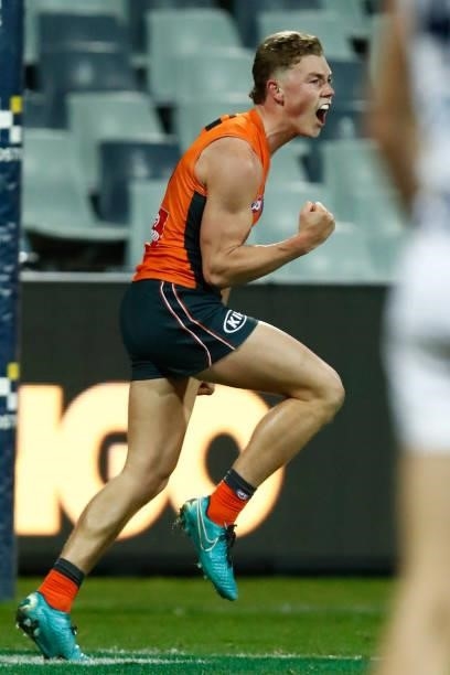 Tanner Bruhn of the Giants celebrates a goal during the round 21 AFL match between Geelong Cats and Greater Western Sydney Giants at GMHBA Stadium on...