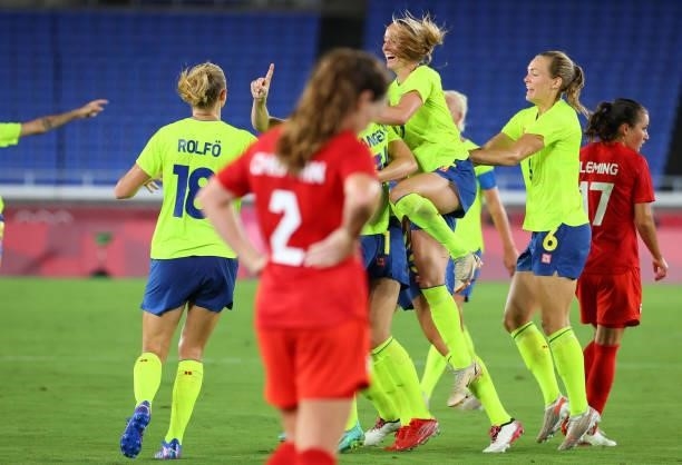 Players of Team Sweden celebrate a goal by Stina Blackstenius of Team Sweden to take a 1-0 lead in the first half during the women's football gold...