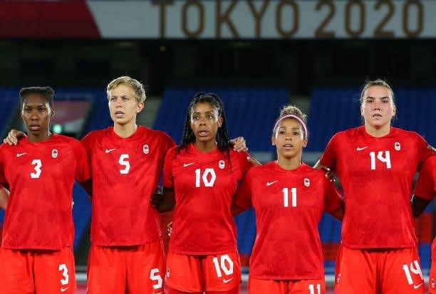 Kadeisha Buchanan, Quinn, Ashley Lawrence, Desiree Scott and Vanessa Gilles of Team Canada line up prior to the Women's Gold Medal Match between...