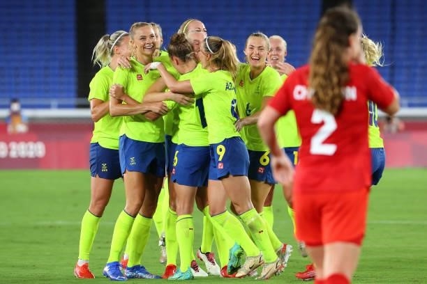 Players of Team Sweden celebrate a goal by Stina Blackstenius of Team Sweden to take a 1-0 lead in the first half during the women's football gold...