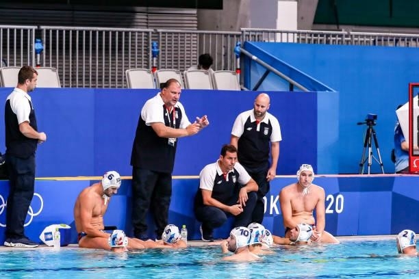 Team Serbia with head coach Dejan Savic of Team Serbia during the Tokyo 2020 Olympic Waterpolo Tournament men's Semi Final match between Serbia and...