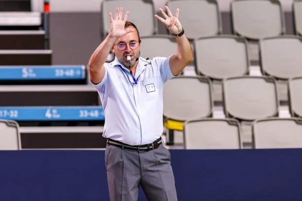 Referee Adrian Alexandrescu of Romania gestures during the Tokyo 2020 Olympic Waterpolo Tournament men's Semi Final match between Serbia and Spain at...