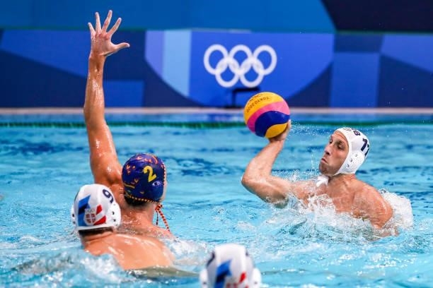 Alberto Munarriz of Team Spain, Andrija Prlainovic of Team Serbia during the Tokyo 2020 Olympic Waterpolo Tournament men's Semi Final match between...