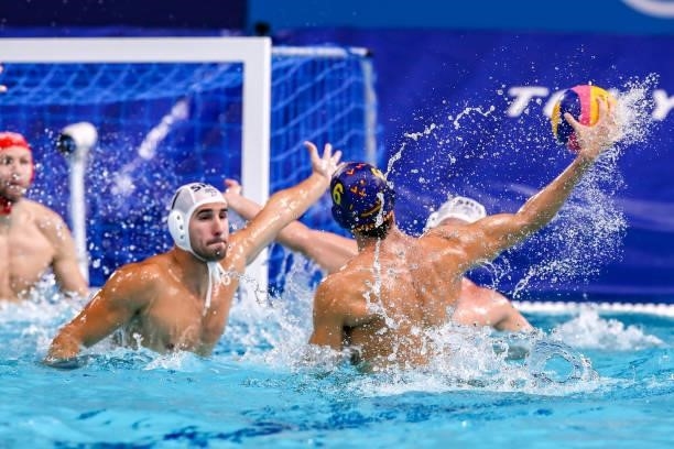 Strahinja Rasovic of Serbia, Marc Larumbe of Team Spain during the Tokyo 2020 Olympic Waterpolo Tournament men's Semi Final match between Serbia and...