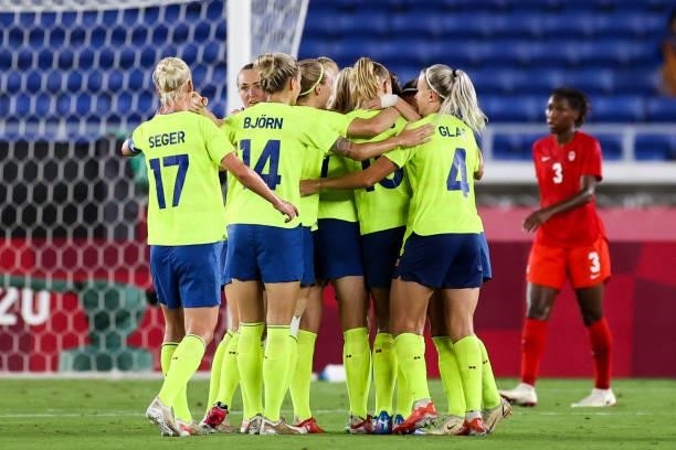 Stina Blackstenius of Sweden celebrates with teammates after scoring the opening goal during the Olympic women's football gold medal match between...