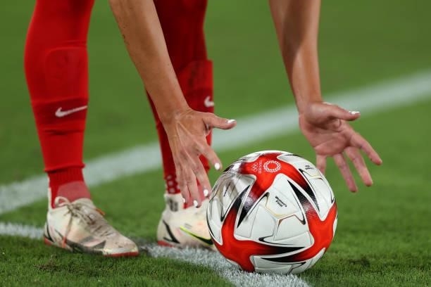Detailed view of the Tokyo 2020 Olympic match ball is seen as it is placed on the corner spot during the Women's Gold Medal Match between Canada and...