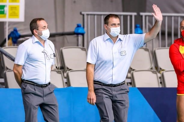 Referee Adrian Alexandrescu , referee Michiel Zwart during the Tokyo 2020 Olympic Waterpolo Tournament men's Semi Final match between Serbia and...