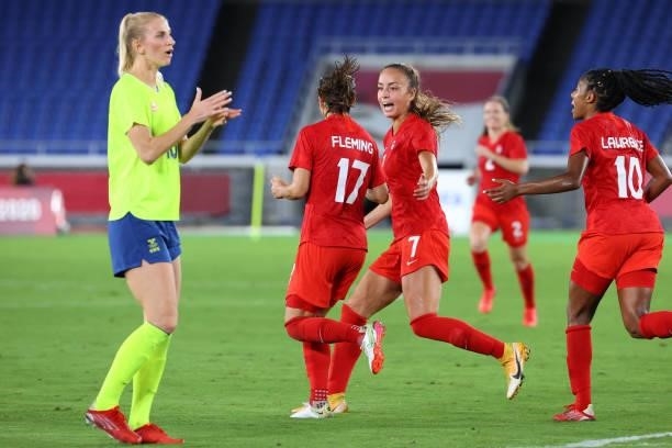 Jessie Fleming celebrates with Julia Grosso of Team Canada after scoring off a penalty kick to tie the game 1-1 in the second half during the women's...