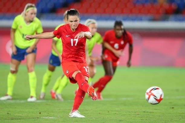 Jessie Fleming of Team Canada scores their team's first goal from the penalty spot during the Women's Gold Medal Match between Canada and Sweden on...