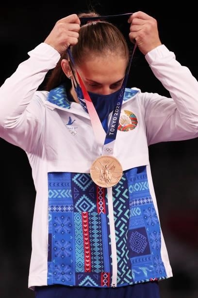 Bronze medalist Vanesa Kaladzinskaya of Team Belarus poses with the bronze medal during the Women's Freestyle 53kg medal ceremony on day fourteen of...