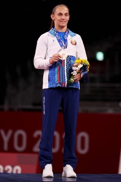 Bronze medalist Vanesa Kaladzinskaya of Team Belarus poses with the bronze medal during the Women's Freestyle 53kg medal ceremony on day fourteen of...