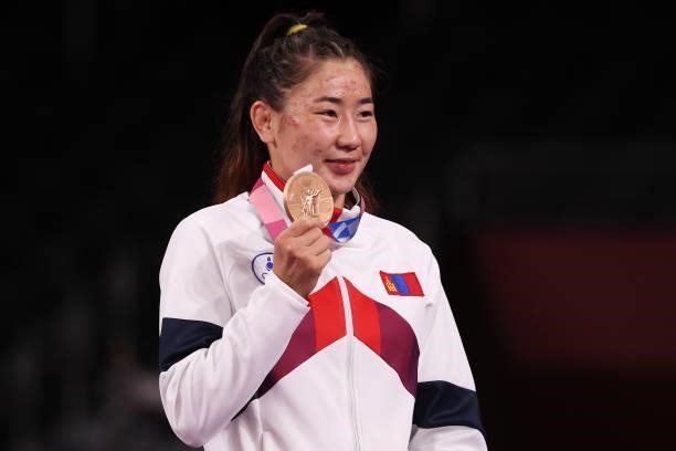 Bronze medalist Bolortuya Bat Ochir of Team Mongolia poses with the bronze medal during the Women's Freestyle 53kg medal ceremony on day fourteen of...