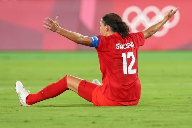 Christine Sinclair of Team Canada appeals for a penalty after being tackled in the penalty area during the Women's Gold Medal Match between Canada...