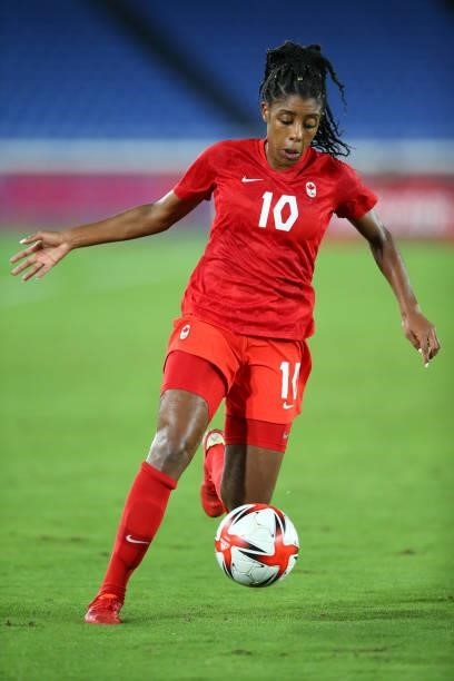 Ashley Lawrence of Team Canada runs with the ball during the Women's Gold Medal Match between Canada and Sweden on day fourteen of the Tokyo 2020...
