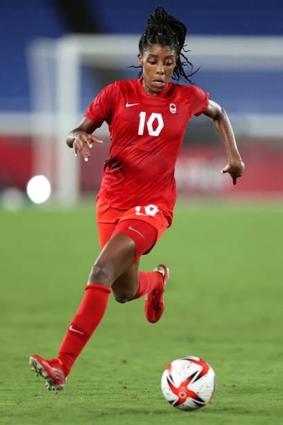 Ashley Lawrence of Team Canada runs with the ball during the Women's Gold Medal Match between Canada and Sweden on day fourteen of the Tokyo 2020...