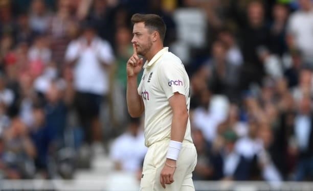 England bowler Ollie Robinson celebrates the wicket of India batsmen Ravindra Jadeja by putting his finger to his lips day three of the First Test...