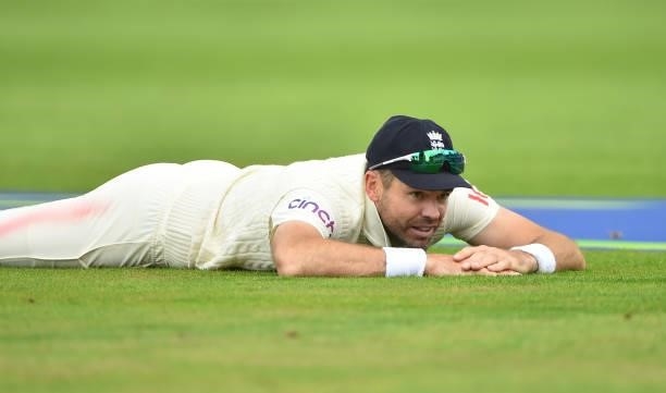 James Anderson of England reacts after he drops Mohammed Shami of India during day three of the First Test Match between England and India at Trent...