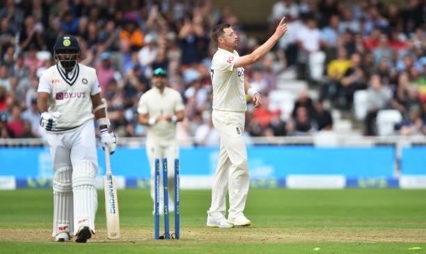 Ollie Robinson of England celebrates after getting Mohammed Shami of India out during day three of the First Test Match between England and India at...
