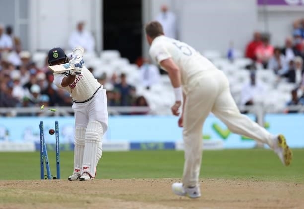 Mohammed Shami of India is bowled by Ollie Robinson of England during day three of the First LV= Insurance test match between England and India at...