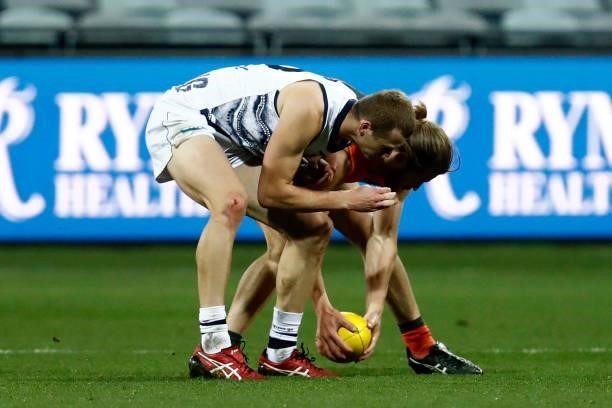 Nathan Kreuger of the Cats and Callan Ward of the Giants collide during the round 21 AFL match between Geelong Cats and Greater Western Sydney Giants...