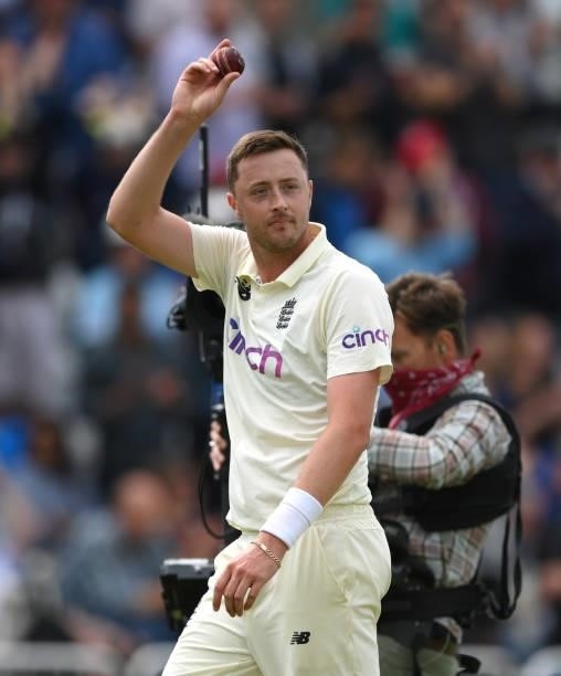 England bowler Ollie Robinson with the ball after taking his 5th wicket of the innings during day three of the First Test Match between Enaches 50...