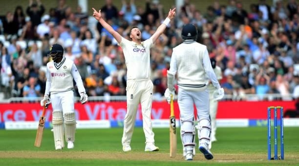 Ollie Robinson of England celebrates after getting 5 wickets as he removes Jasprit Bumrah of India during day three of the First Test Match between...