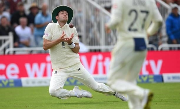England fielder Stuart Broad takes the catch to dismiss Bumrah off the bowling of Ollie Robinson during day three of the First Test Match between...