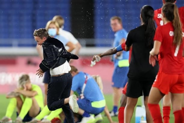 Bev Priestman, Head Coach of Team Canada celebrates after their team's victory in the shootout during the Women's Gold Medal Match between Canada and...