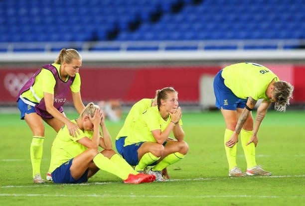 Lina Hurtig of Team Sweden and teammates look dejected after loosing in the penalty shootout during the Women's Gold Medal Match between Canada and...