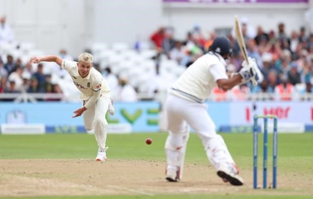 Sam Curran of England bowls at Mohammed Siraj of India during day three of the First LV= Insurance test match between England and India at Trent...
