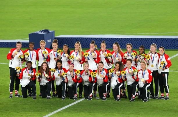 Gold Medalists of Team Canada pose with their gold medals during the Women's Football Competition Medal Ceremony on day fourteen of the Tokyo 2020...