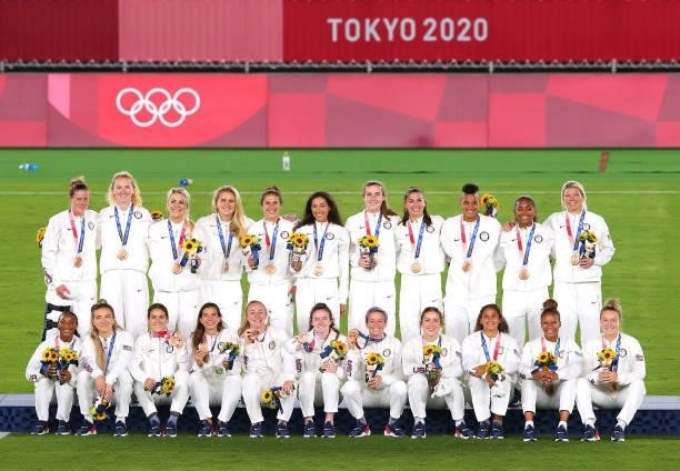 Bronze medalists Team USA pose with their bronze medals during the Women's Football Competition Medal Ceremony on day fourteen of the Tokyo 2020...