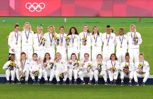 Bronze medalists Team USA pose with their bronze medals during the Women's Football Competition Medal Ceremony on day fourteen of the Tokyo 2020...