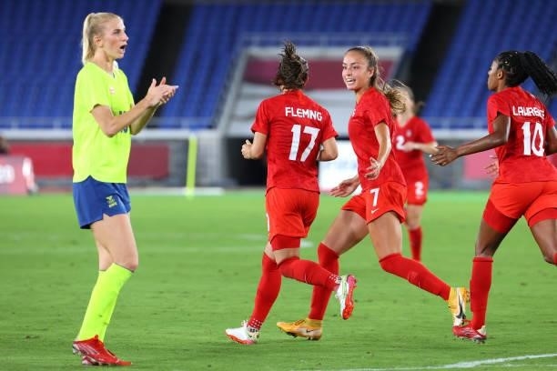 Jessie Fleming celebrates with Julia Grosso of Team Canada after scoring off a penalty kick to tie the game 1-1 in the second half during the women's...