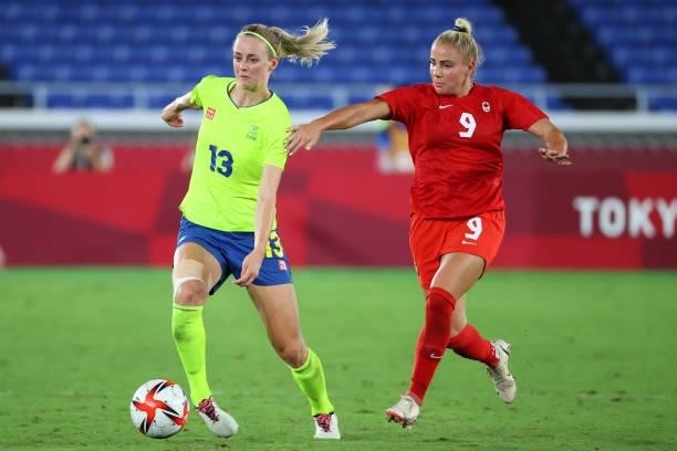 Amanda Ilestedt of Team Sweden controls the ball against Adriana Leon of Team Canada during the second half during the women's football gold medal...