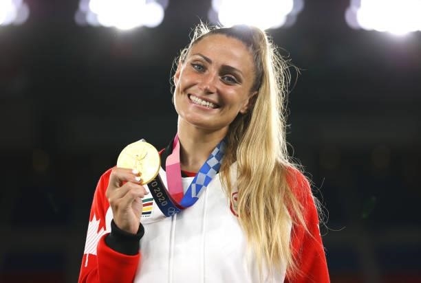 Gold medalist Shelina Zadorsky of Team Canada poses with their gold medal during the Women's Football Competition Medal Ceremony on day fourteen of...