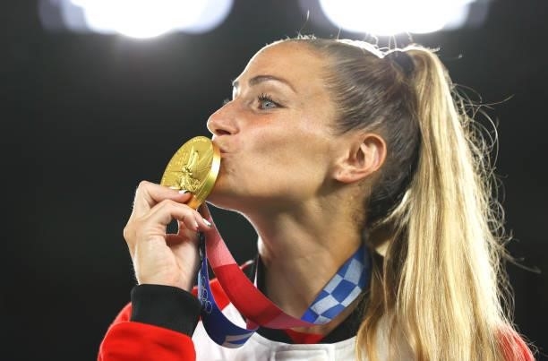 Gold medalist Shelina Zadorsky of Team Canada kisses their gold medal during the Women's Football Competition Medal Ceremony on day fourteen of the...
