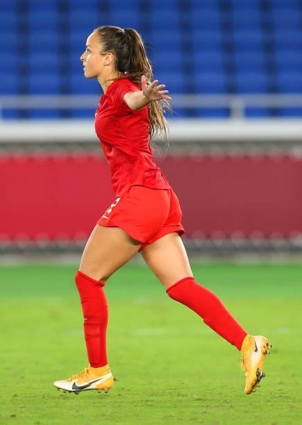 Julia Grosso of Team Canada celebrates after scoring their team's winning penalty in the shootout during the Women's Gold Medal Match between Canada...