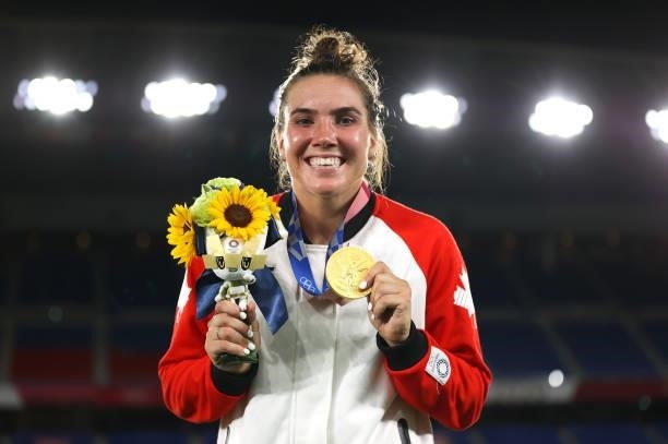 Gold medalist Vanessa Gilles of Team Canada poses with her gold medal during the Women's Football Competition Medal Ceremony on day fourteen of the...