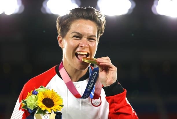 Gold medalist Erin McLeod of Team Canada poses with their gold medal during the Women's Football Competition Medal Ceremony on day fourteen of the...