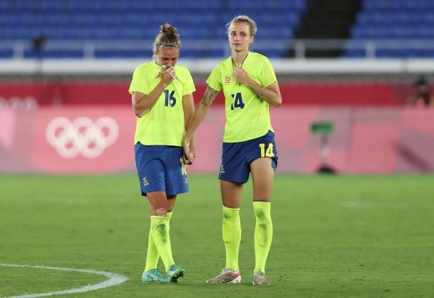 Filippa Angeldal and Nathalie Bjorn of Team Sweden look dejected following defeat in the Women's Gold Medal Match between Canada and Sweden on day...