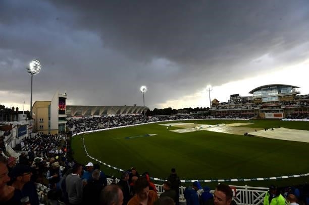 General view of the covers as rain stops play during day three of the First Test Match between England and India at Trent Bridge on August 06, 2021...