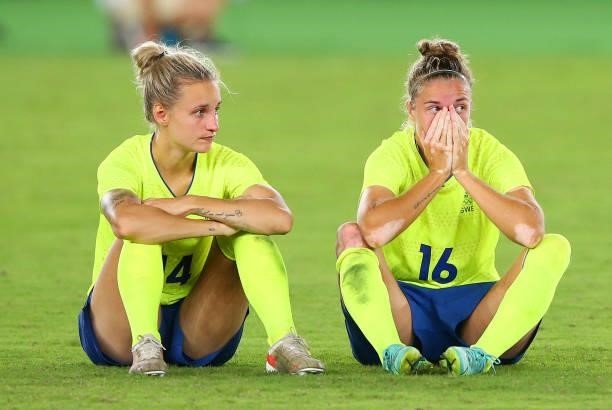 Nathalie Bjorn and Filippa Angeldal of Team Sweden look dejected after loosing in the penalty shootout during the Women's Gold Medal Match between...