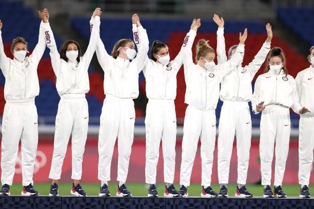 Bronze medalists Team USA pose on the podium during the Women's Football Competition Medal Ceremony on day fourteen of the Tokyo 2020 Olympic Games...
