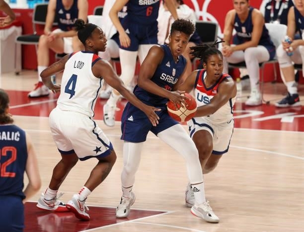 Yvonne Anderson of Serbia between Jewell Loyd and Ariel Atkins of USA during the Women's Semifinal Basketball game between United States and Serbia...