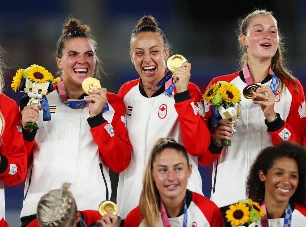 Gold medalists Vanessa Gilles and Kailen Sheridan of Team Canada pose with her gold medal during the Women's Football Competition Medal Ceremony on...