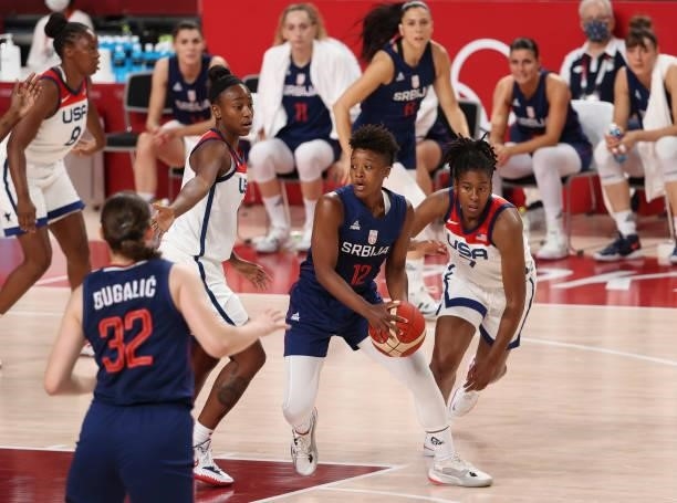 Yvonne Anderson of Serbia between Jewell Loyd and Ariel Atkins of USA during the Women's Semifinal Basketball game between United States and Serbia...