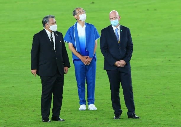 Gianni Infantino, President of FIFA is seen wearing a face mask as he waits for the Women's Football Competition Medal Ceremony on day fourteen of...