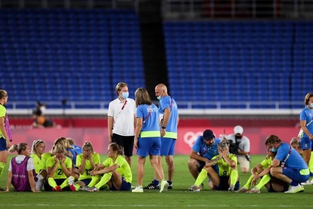 Players of Sweden show their dejection after the penalty shout out of the Olympic women's football gold medal match between Sweden and Canada at...