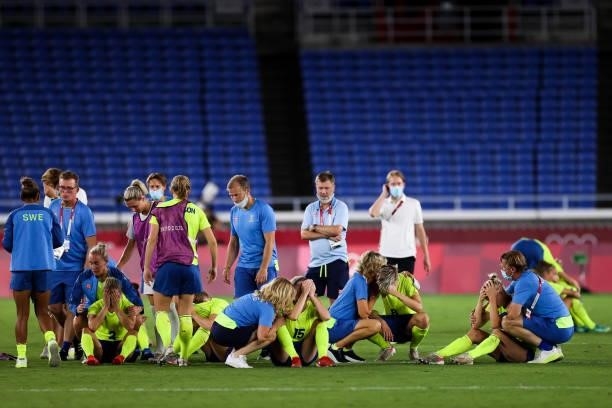 Players of Sweden show their dejection after the penalty shout out of the Olympic women's football gold medal match between Sweden and Canada at...